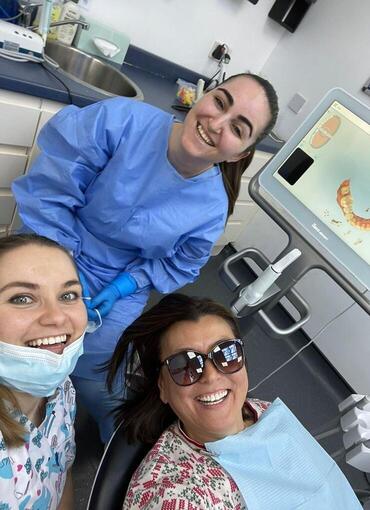 Doctor Julia and dental assistant Ornela with Doctor and co-founder Gulzat